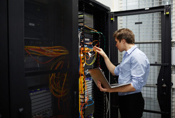 Working in data storage lab Staff of cryptocurrency hardware service checking system of crypto transaction